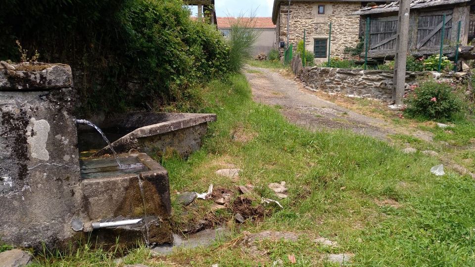 Vecinos de Acevedo exigen la reparación de una pista que lleva 40 años sin asfaltar