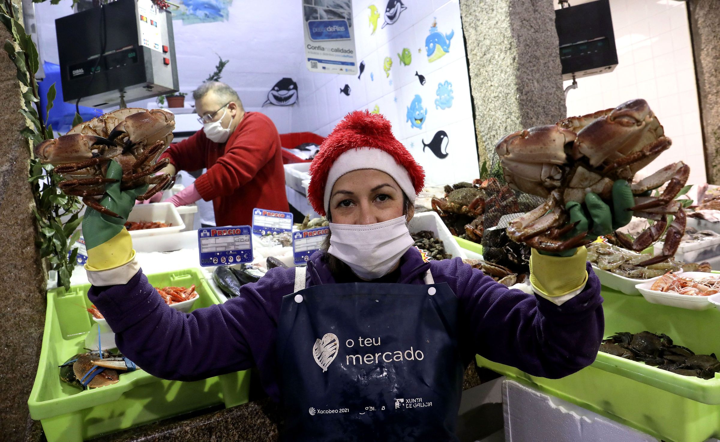 Ambiente no Mercado de Abastos de Santiago na vspera de noiteboa. 23/12/2021