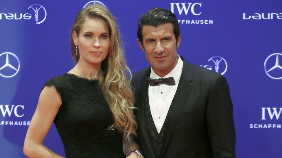 Luis Figo y su esposa.