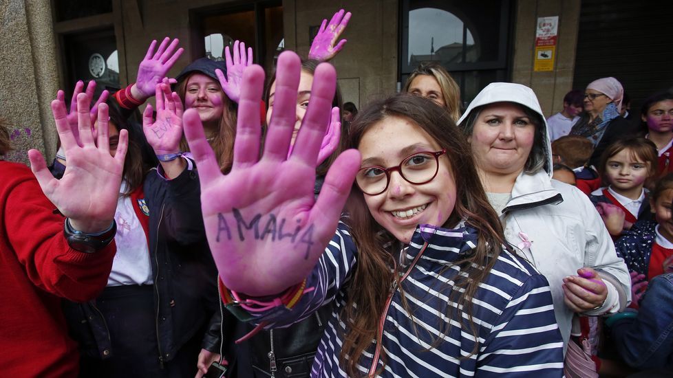 Manos levantadas por el cáncer de mama