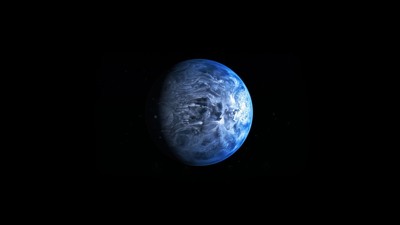 Imagen de archivo de un planeta azul fuera del sistema solar.