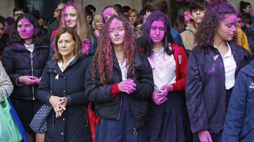 Manos levantadas por el cáncer de mama